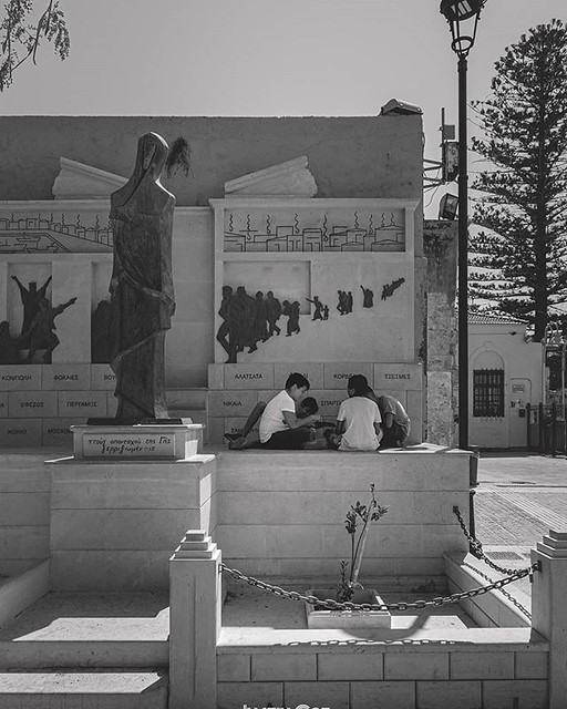 Walking through Mikrasiaton Square I found this wonder striking remembrance monument, It was a nice sunny day so the local kids found somewhere to play........ Follow for more Crete travel photography · · · · · #monument #streetphotography #crete #travel