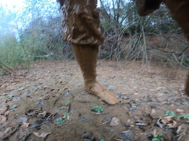 Rubber riding boots short in mud quarry