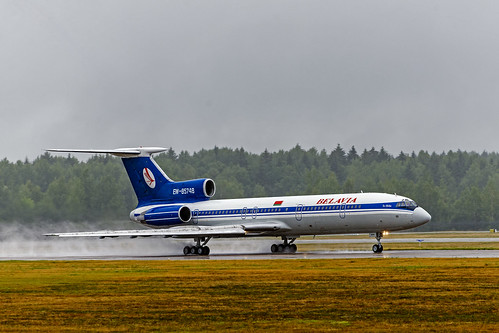 aircraft airplane airliner airport jet msq umms runway takeoff rain tupolev 154m ew85748 belavia 92a924