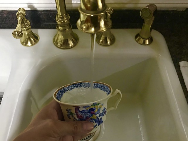washing a  tea cup