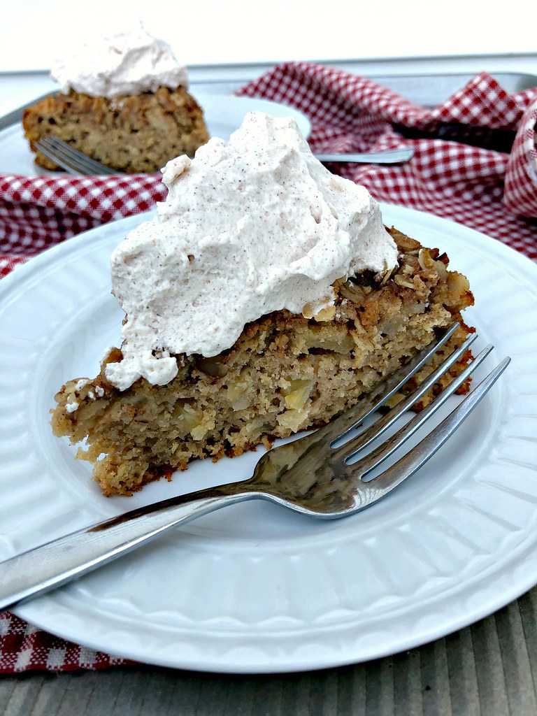 two slices of whole grain apple cake with yogurt whipped cream
