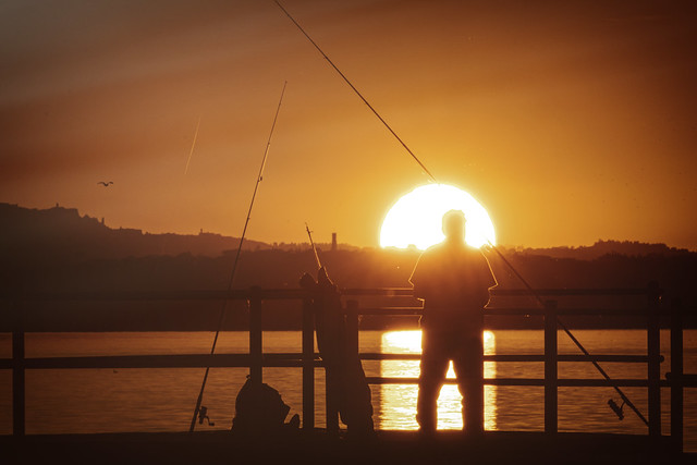 Pesca-tramonto