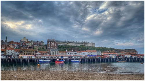 whitby bay harbour boats shore sea seafront seaside sand wall buildings houses urban clouds cloud sky skywatching nature naturephotography naturelovers natureseekers weather weatherwatch image imageof imagecapture photography photoof yorkshire nyorks