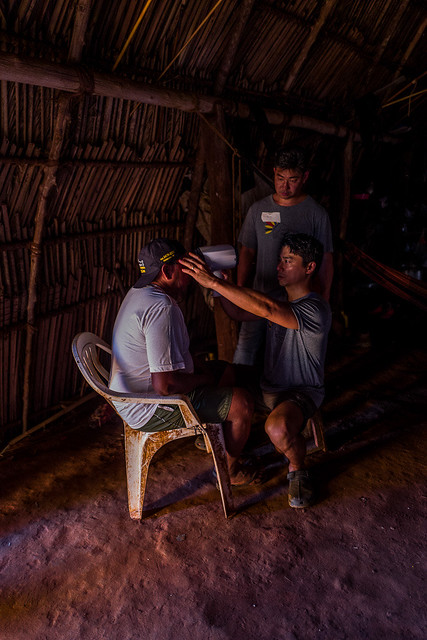 Portable Autorefractor beeing used in indigenous community in Indigenous Park of Xingu in Brazil