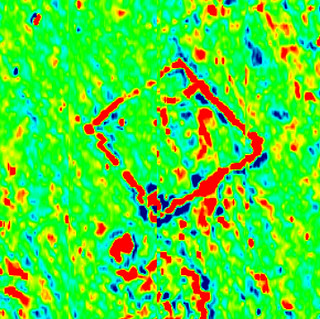 An image produced using remote sensing. It shows a square building underneath the surface of the ground