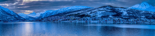 Panoramic sunrise view of the mountains and landscape aboard the Viking Sky cruise ship sailing on Ofotfjord at Narvik, Norway -10a