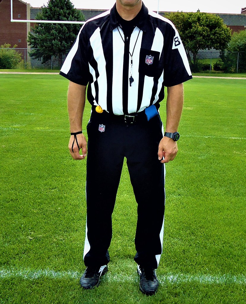 NFL Referee uniform with black striped pants and Reebok sh… | Flickr