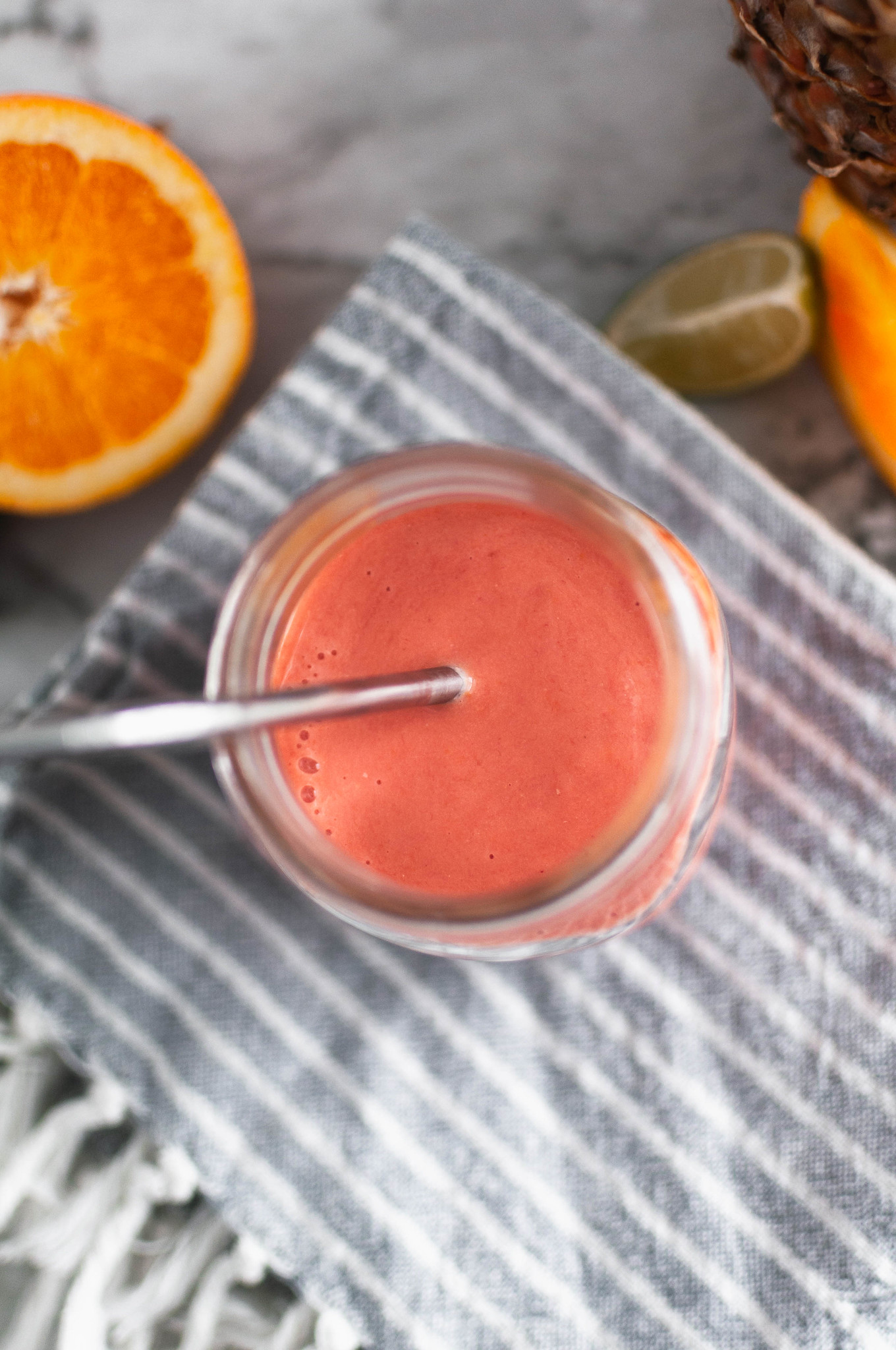 Get all the flavors of rainbow sherbet without all the sugar with this Rainbow Sherbet Smoothie. Fresh orange, lime juice, frozen raspberries and pineapple along with raspberry Greek yogurt all come together to make this incredibly fruity, healthy smoothie.