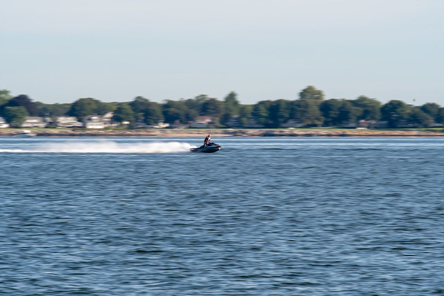 abstract of man on a jetski moving fast