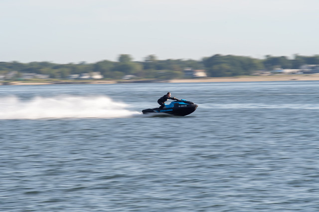 abstract of man on a jetski moving fast