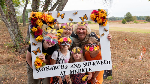 Photo of group of people in costume at monarch festival