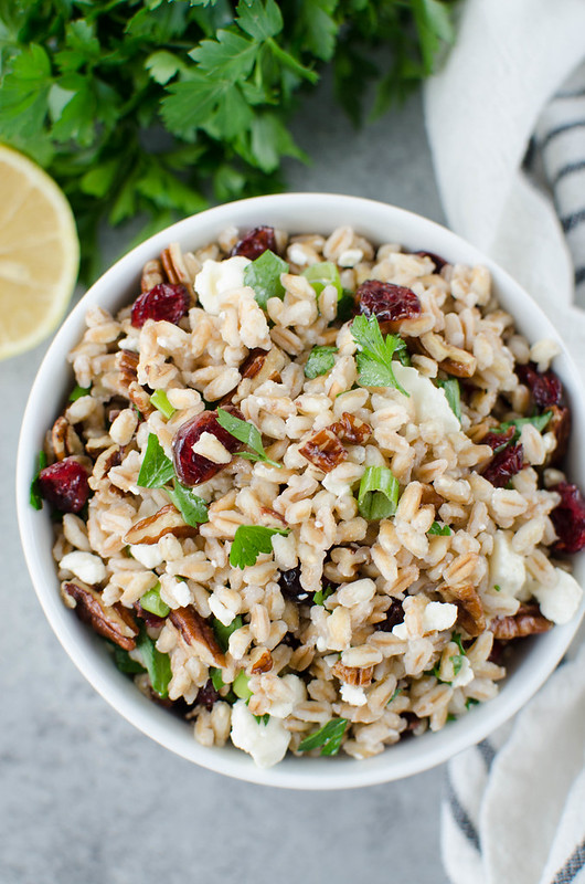 Farro Salad with Cranberries, Feta, and Pecans - a great holiday side dish recipe! Farro tossed with dried cranberries, feta cheese, and pecans in a light lemony dressing. 