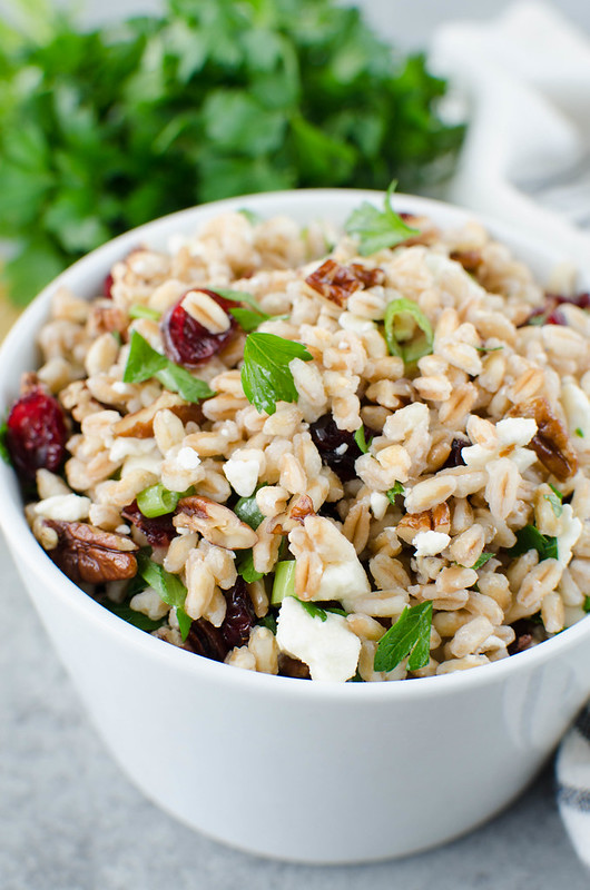 Farro Salad with Cranberries, Feta, and Pecans - a great holiday side dish recipe! Farro tossed with dried cranberries, feta cheese, and pecans in a light lemony dressing. 