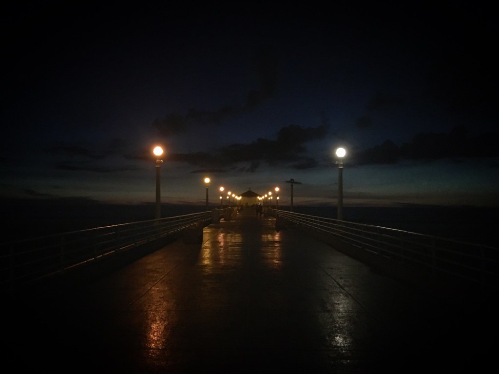 Dusk view of the ocean pier after the rain, Manhattan Beach, California, USA, January 2019