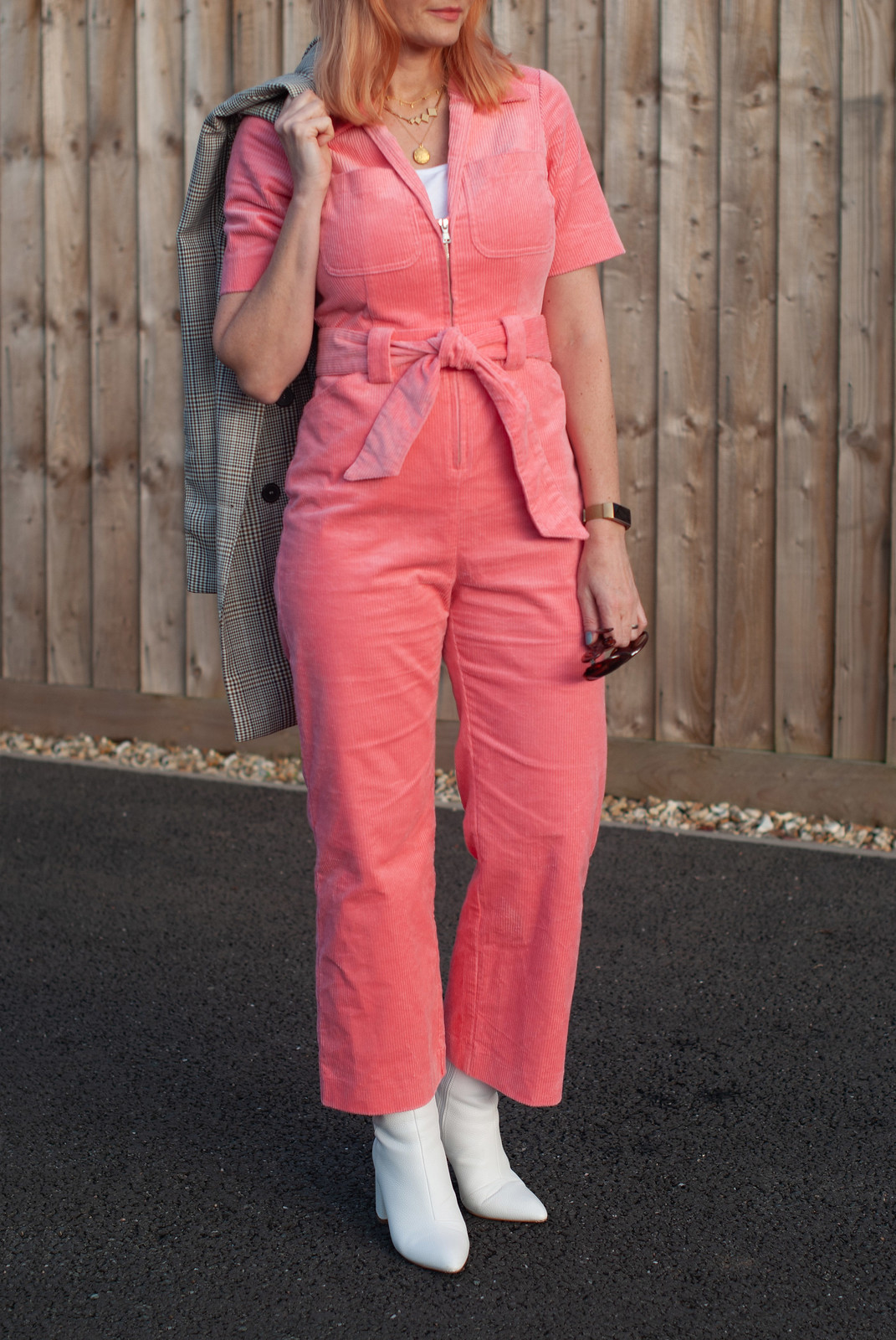 A Pink Corduroy Jumpsuit Styled With White \ 70s style \ white boots \ Prince of Wales check blazer \ gold layered necklaces | Not Dressed As Lamb, over 40 fashion and style blogger