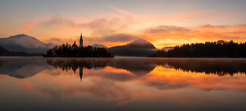 Lake of Bled at Sunrise by Palnick, Lake of Bled at Sunrise - Sloveniaarchitecture atmosphere autumn blue castle church city europe euro