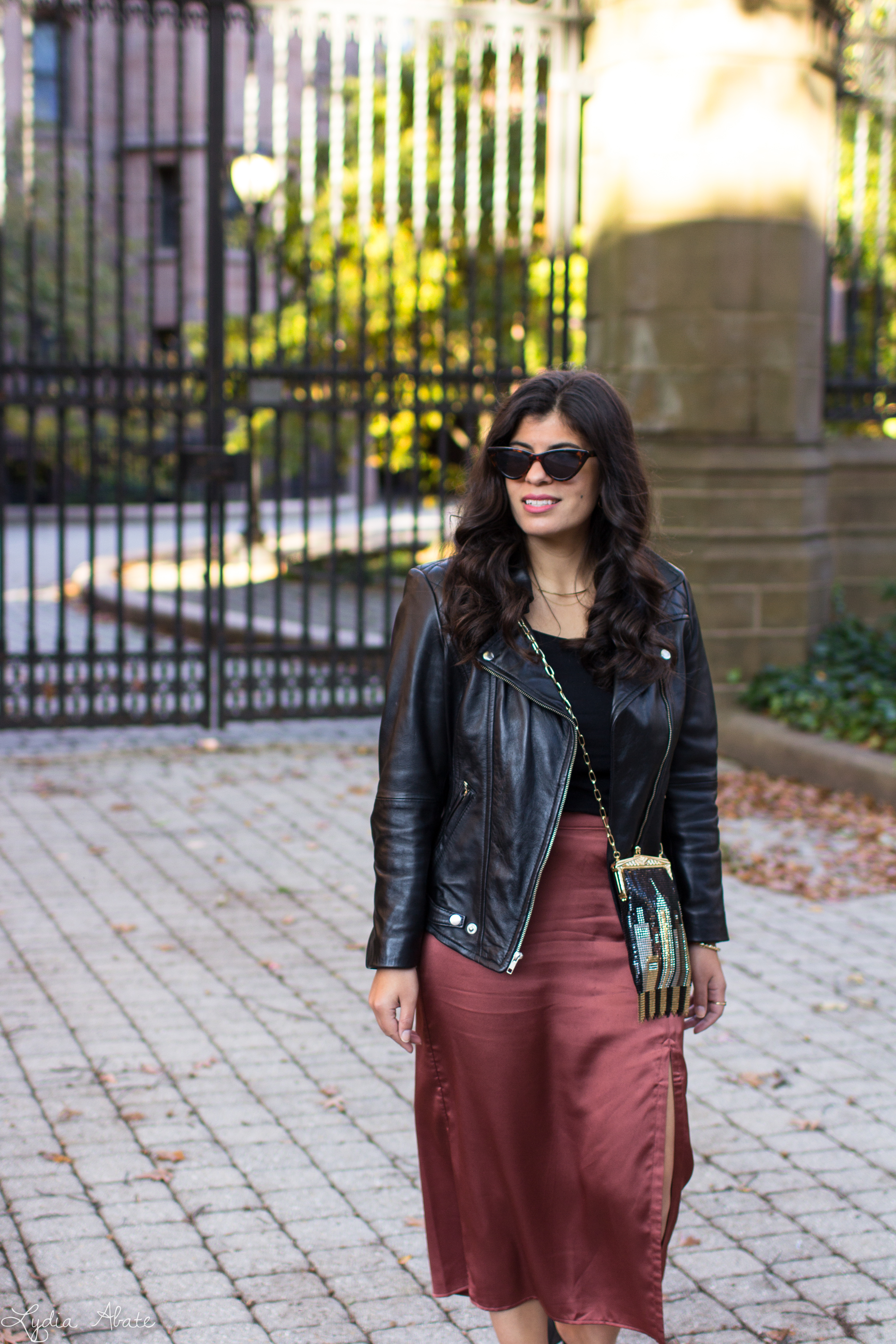rust midi skirt, black off the shoulder top, leather jacket, skyline clutch-1.jpg