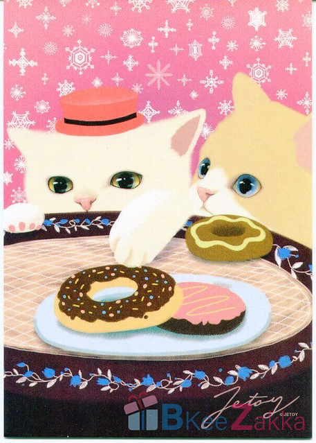 Two cats with a sweet tooth