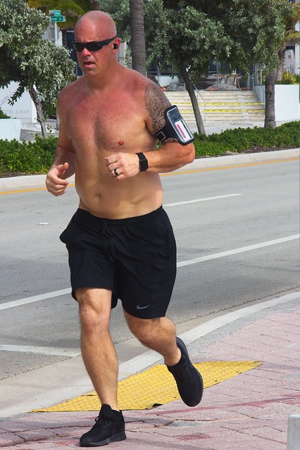 Shirtless Man Jogging