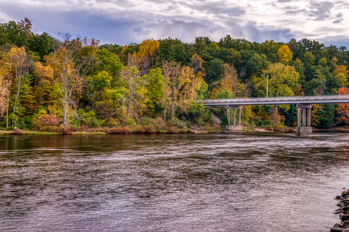 hdr michigan muskegonriver nikon nikond5300 outdoor autumn bridge clouds color colorful fall foliage geotagged outside river sky tree trees water