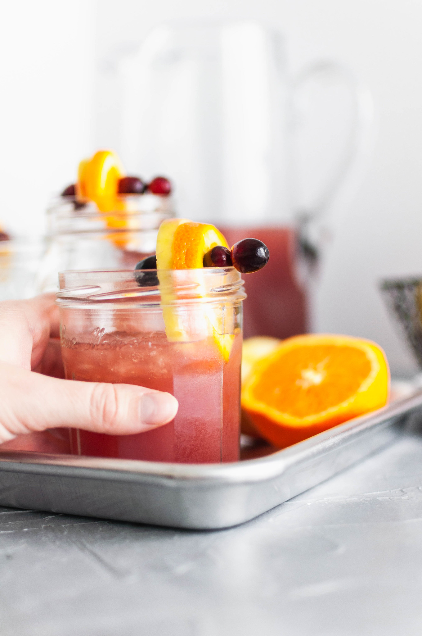 This Thanksgiving Punch is the perfect festive drink to serve on Thanksgiving. Cranberry juice, orange juice, apple cider and ginger beer create a deliciously addictive punch. Spiced rum optional.
