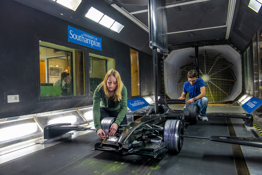 Engineers test race car in wind tunnel