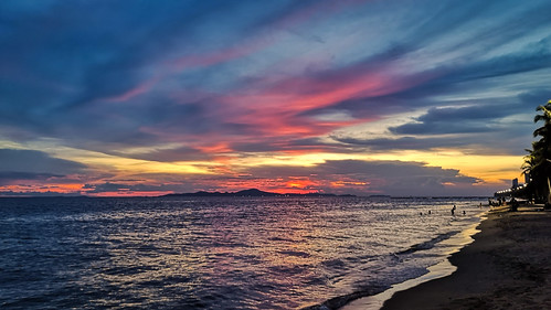 sunset coastline horizon over water dramatic sky twilight dusk bay idyllic beach thailand jomtien seascape