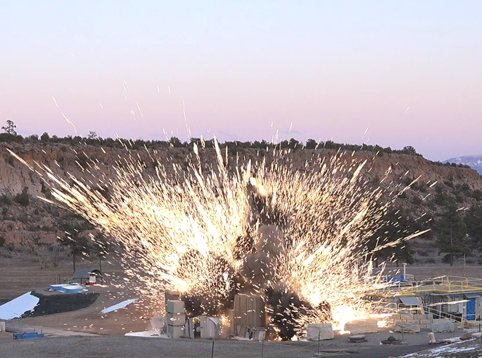 An explosives test taking place in a canyon on LANL property.