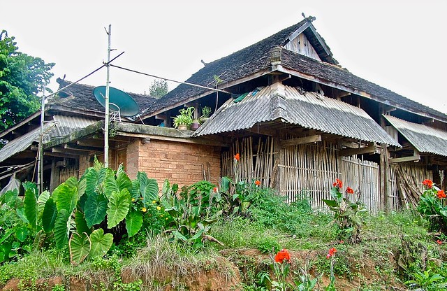 Traditional house, Aini Village, Xishuangbanna, Yunnan, Southwest China, Asia