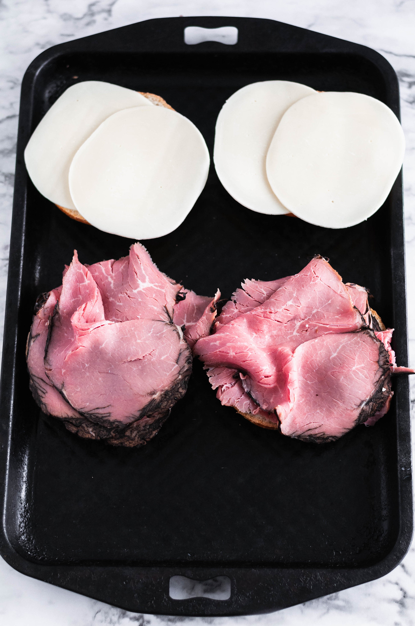 Meet your new favorite 15 minute meal, the Roast Beef Melt. Deli roast beef, melted provolone and horseradish sauce all on a crusty roll and toasted to perfection under the broiler.
