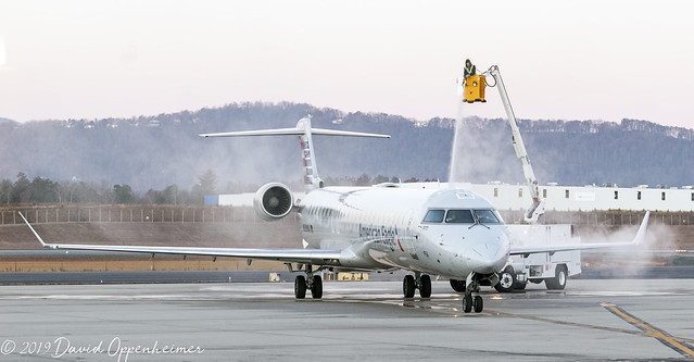 De-icing American Airlines Jet at Asheville Regional Airport