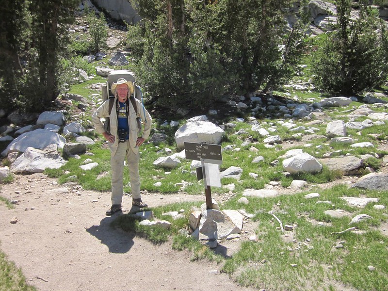 Me posing with the trail signs at the junction of the PCT-JMT and the 60 Lakes Trail