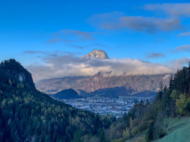 View of Kufstein and clouded Pendling mountain from Zahmer Kaiser mountains in Tyrol, Austria