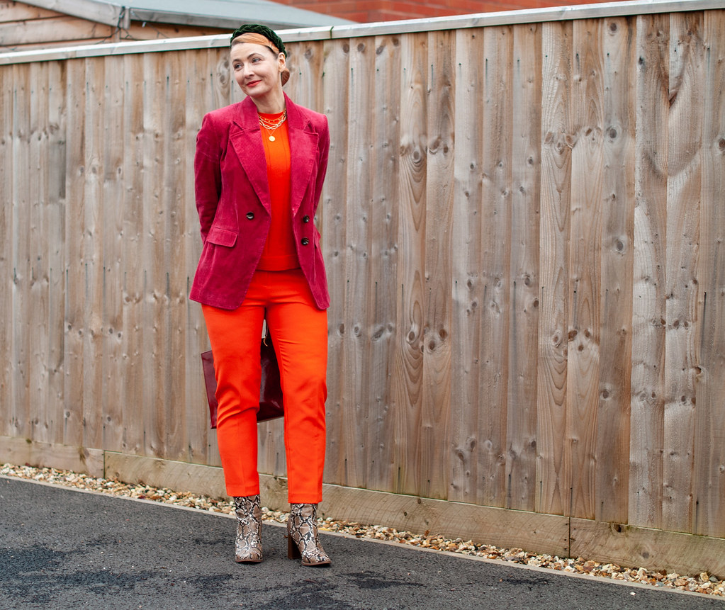 How to Wear Red With Orange: red corduroy blazer, orange sweater, orange tailored trousers, snakeskin boots | Not Dressed As Lamb, over 40 style blog