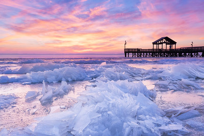 winter sunrise with icy water