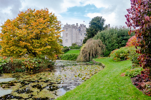 sizergh castle mansion statelyhome building architecture listed nationaltrust lakedistrict nationalpark garden pond lake water grass lawn tree shrub autumn colour sky landscape cumbria english england hdr