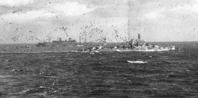 Convoy - USS Arkansas with passenger ship  - WWII, zoomed in