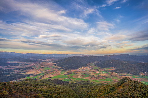 catalonia spain mountains clouds sky trees foliage autumn sanctuary valley sunset