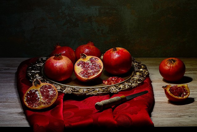 Pomegranates on an old plate