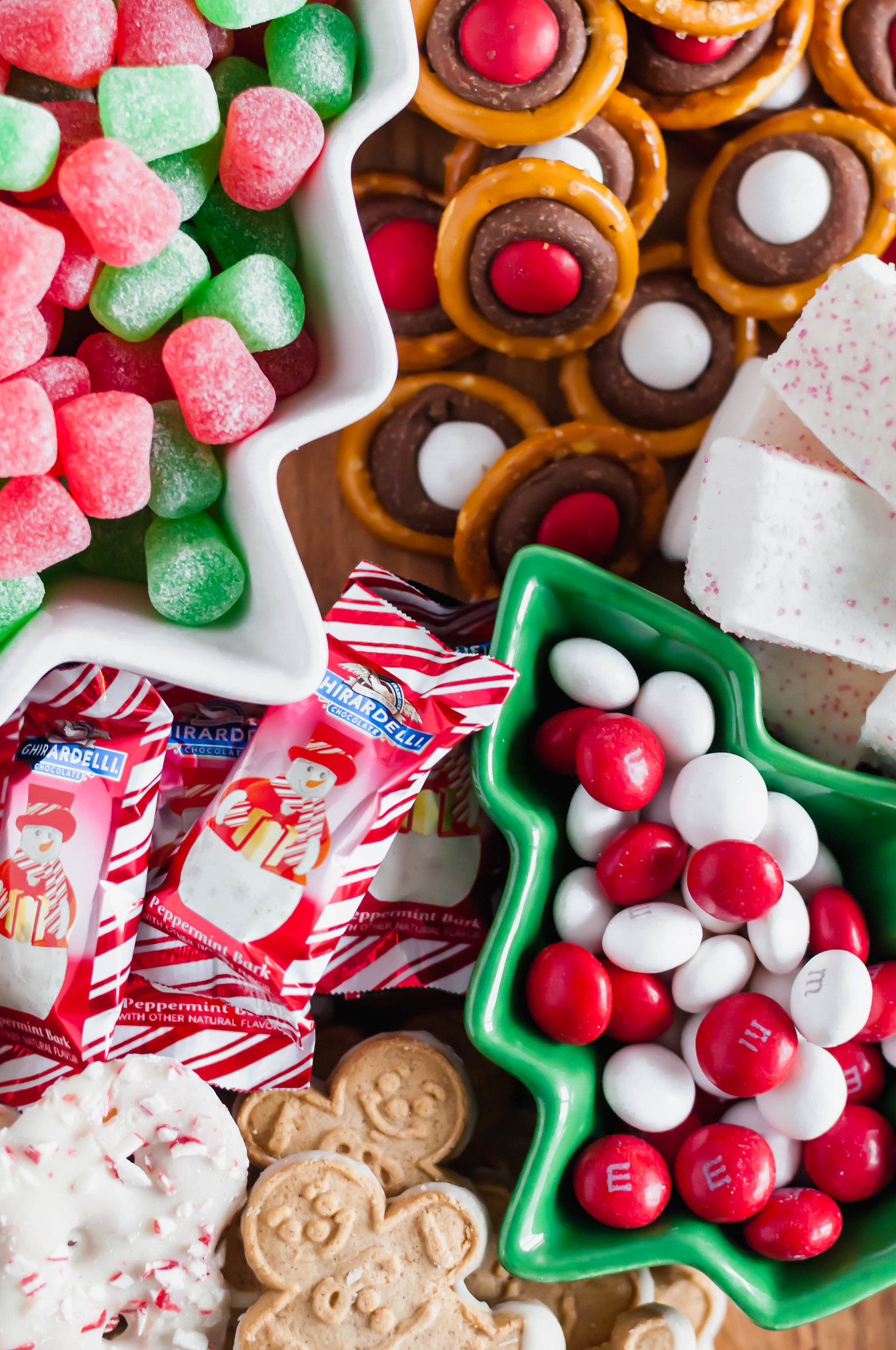 This Easy Christmas Dessert Board will be the talk of your Christmas party. A homemade treat or two filled in with fun, festive cookies and candies.