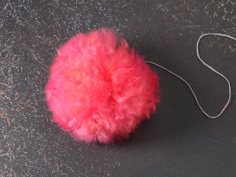 Hand dyed Alpaca Fur Pompom – neon pink/orange – ethically sourced