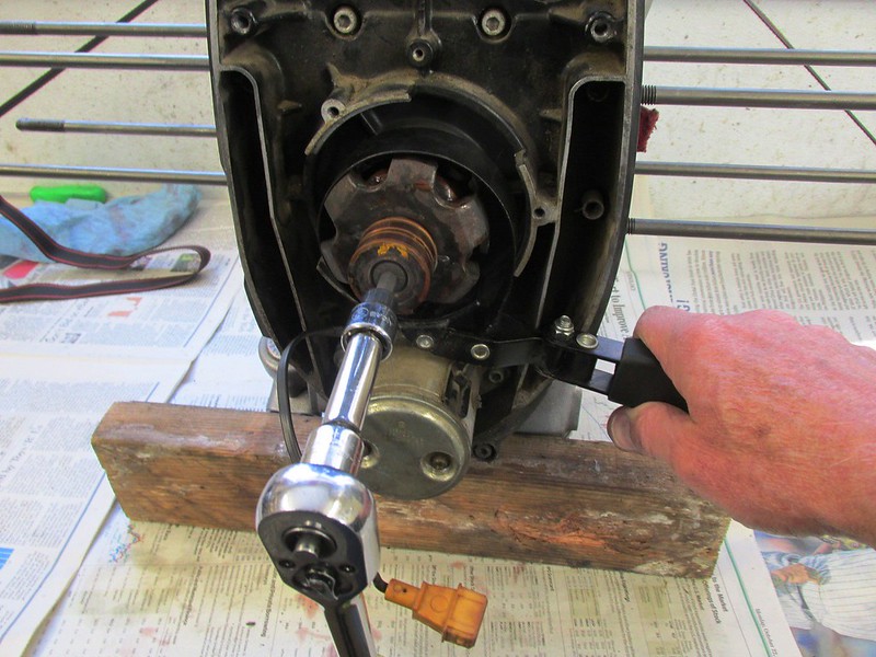 Remove Rotor Bolt While Clamping Rotor Steel Fingers In Oil Filter Wrench