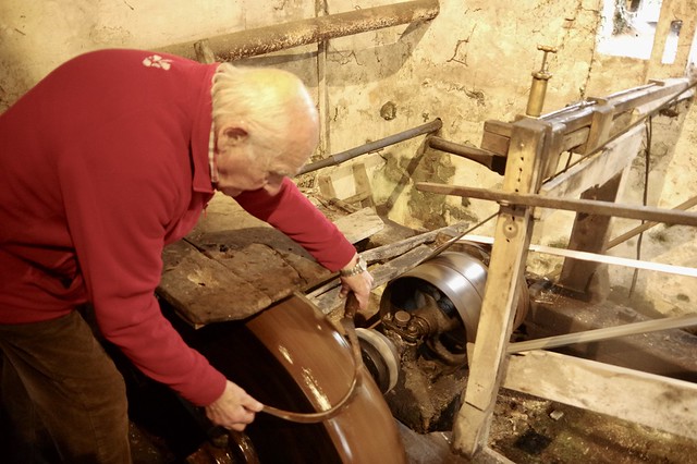 Our 91 Year Old Guide Demonstrating Water Powered Tool Sharpening