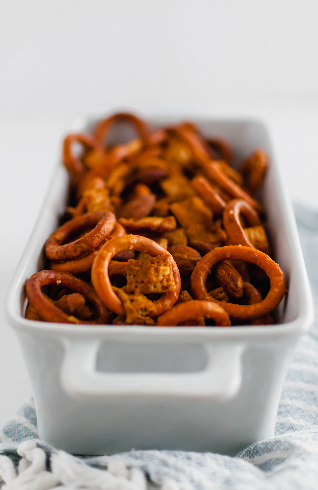 Need to add a little spice to your holidays? This Spicy Chex Mix is just what you need for snacking.