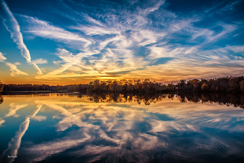 sunset lake reflection circles touch gentle lines sky ways drawing pattern picture depiction harmony save what you got see home keep peace compassion nikkor nikon outside water nature blue orange light clouds landscape magic photography open wide our treasure preserve guard