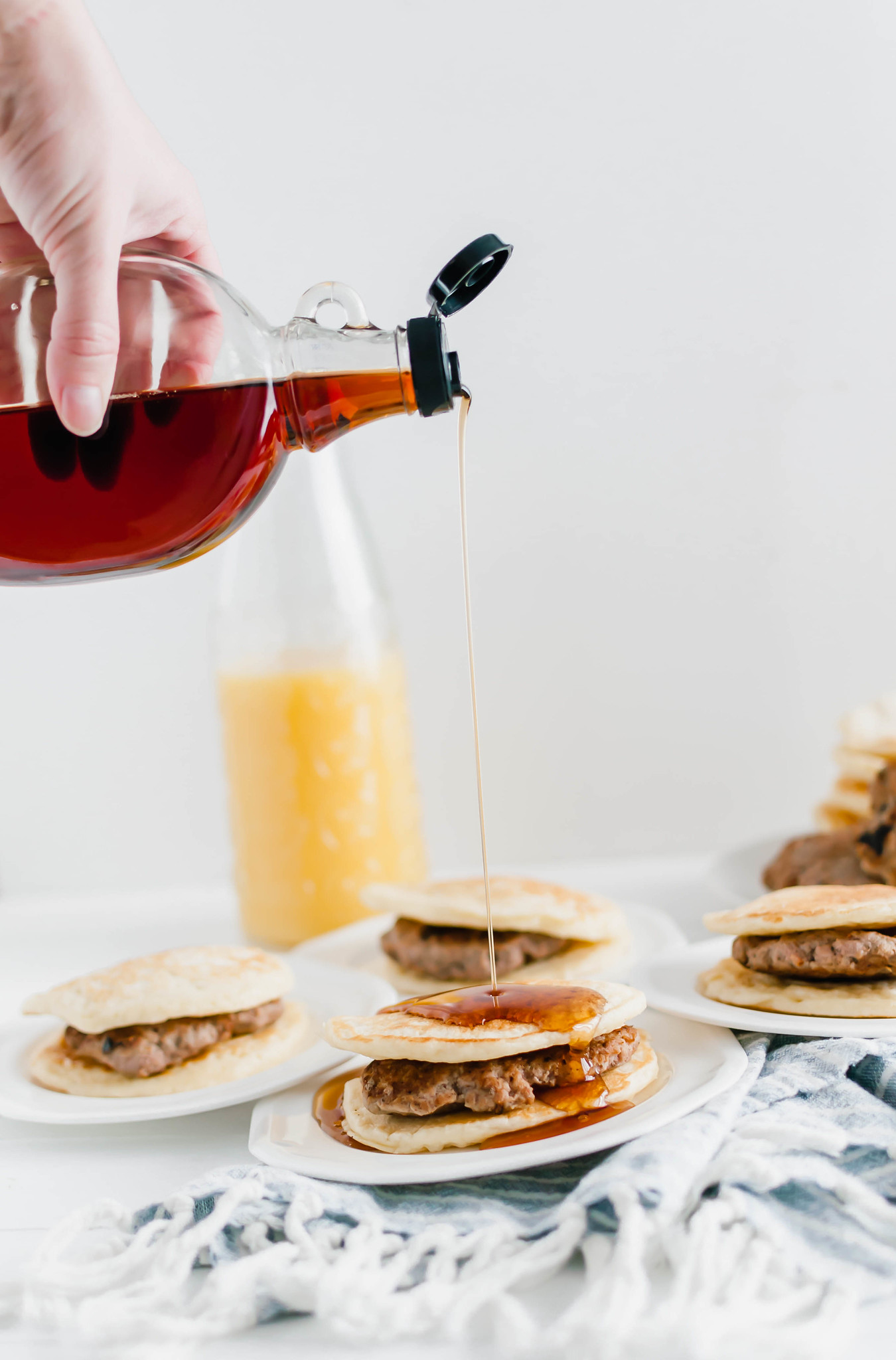 Turkey isn't just for dinner. This Turkey Sausage Breakfast Sandwich is super filling and will keep you energized all day. Juicy homemade turkey sausage patties sandwiched between two fluffy buttermilk pancakes. Maple syrup drizzle optional.
