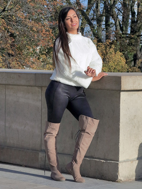 South American girl wearing leather pants and musketeer boots