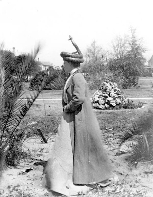 Woman with stuffed rattlesnake hat on her head - Eustis