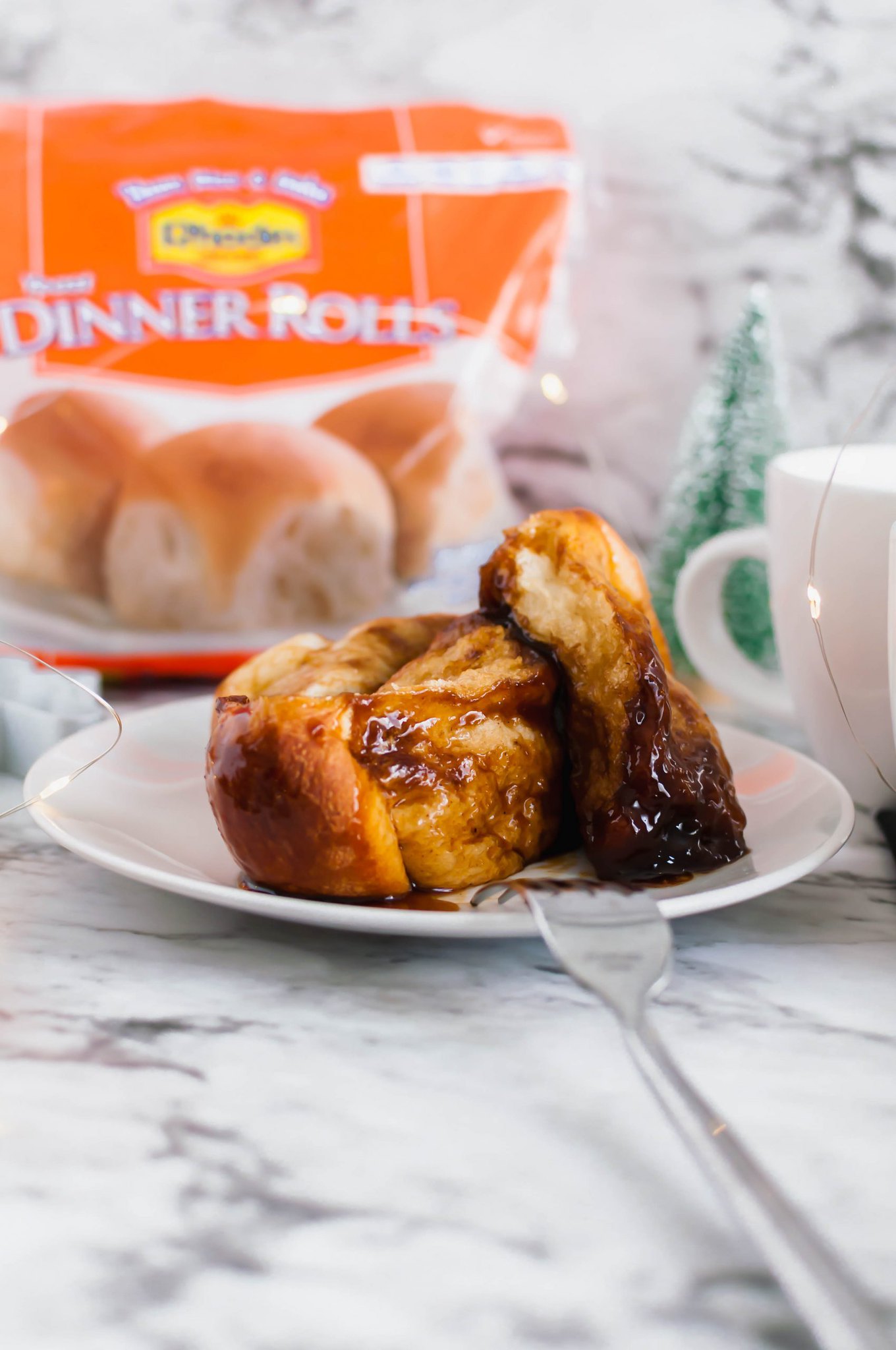 The perfect Christmas morning breakfast, Gingerbread Monkey Bread. Make it the night before and bake in the morning. Filled with warm gingerbread spices.
