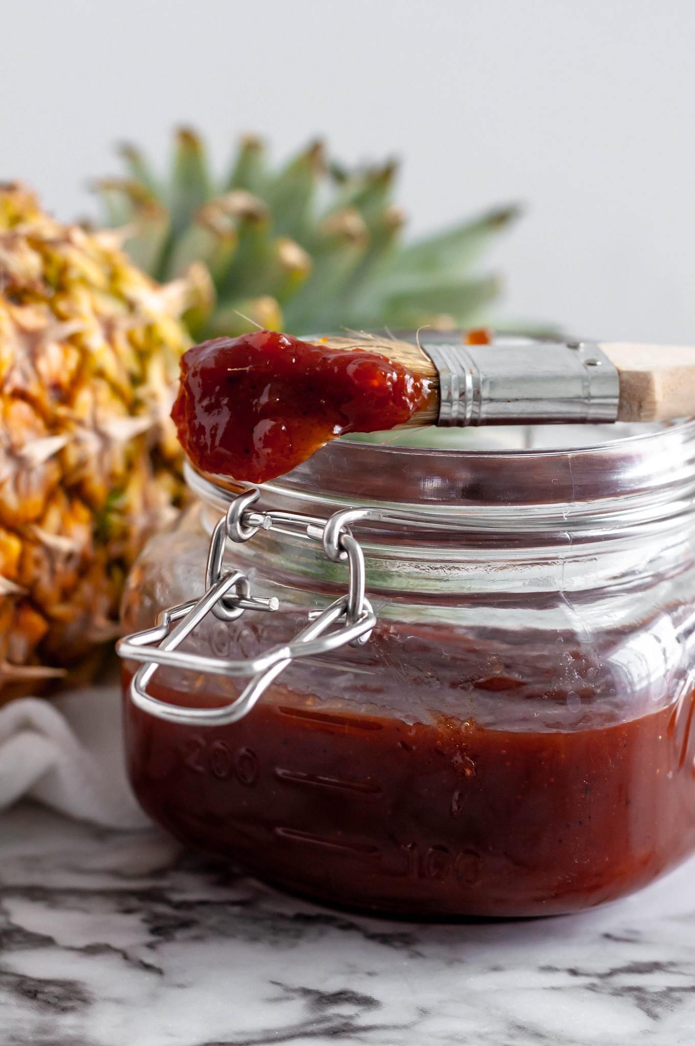 Whip up at batch of Pineapple BBQ Sauce in the instant pot. Sweet, smoky and perfect on everything.